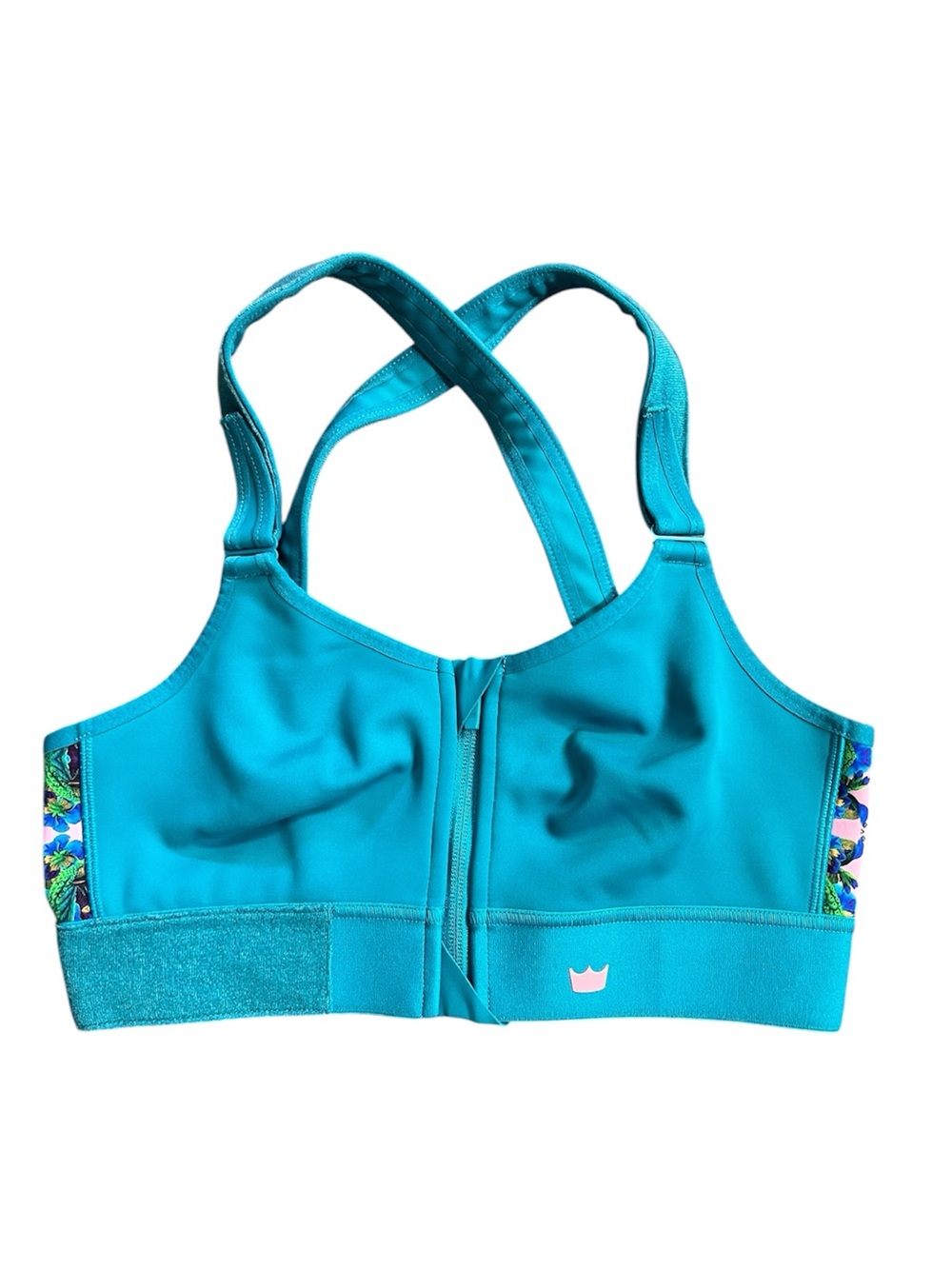 SheFit teal sports bra with animal kaleidoscope print on sides